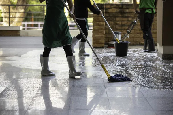Detail cleaning of hallways after construction